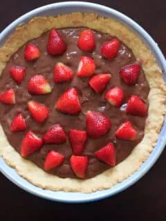 Nutella pudding with a homemade tart crust topped with strawberries. Because fruit + chocolate = healthy dessert!