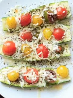 Quick and easy zucchini boats - a healthy meal or snack ready in 5 minutes! Endless options for toppings! | trialandeater.com