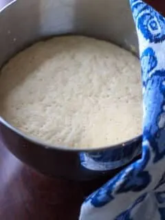 Easy Homemade Pizza Dough - Make your own dough in less time than ordering in. Quick yeast dough will make dinner prep easy!