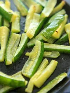 Baked Zucchini with Truffle Oil is the perfect easy side dish! Delicious and quick way to eat up your zucchini crop.