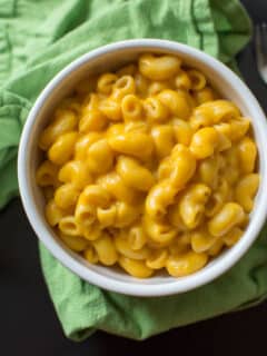 Cheddar Pumpkin Mac and Cheese is an easy and delicious autumn meal. Option to serve as stovetop macaroni in under 30 minutes, or turn into a crunchy casserole.