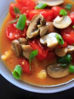 Cheesy Cauliflower Grits with Mushroom and Tomato Gravy. Get your fill of vegetables with this flavorful meal ready in about 20 minutes!