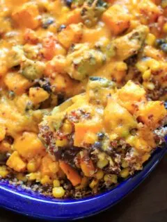 Butternut squash and other vegetables mixed together with quinoa makes a delicious vegetarian, gluten-free, and vegan friendly casserole for the whole family.