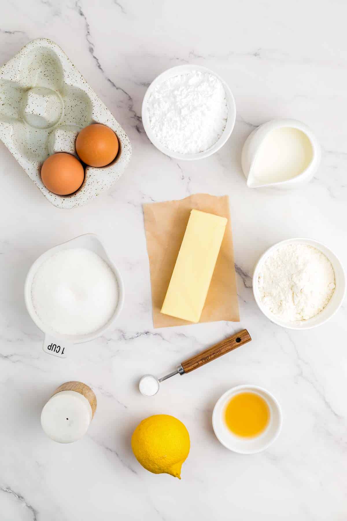 ingredients to make lemon cupcakes on counter