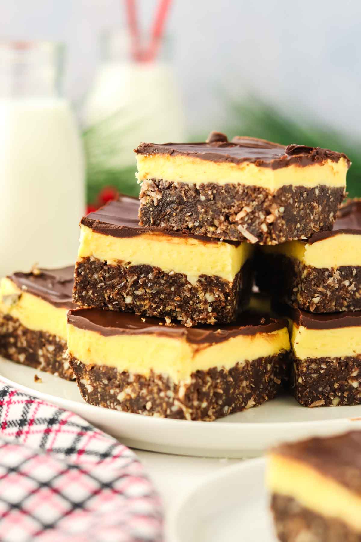 stack of Nanaimo Bars on white plate