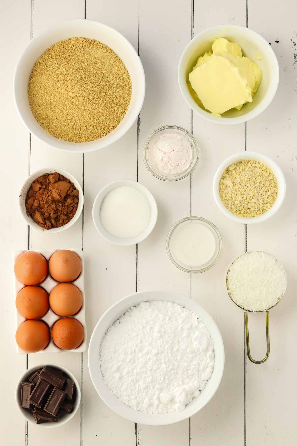 ingredients needed for Nanaimo Bars Recipe in individual bowls