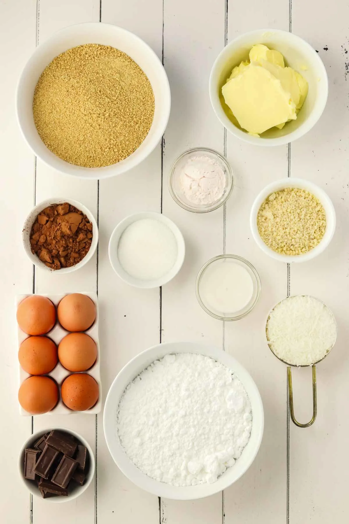 ingredients needed for Nanaimo Bars Recipe in individual bowls