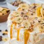 banoffee cake pin with full cake and caramel drizzle down side