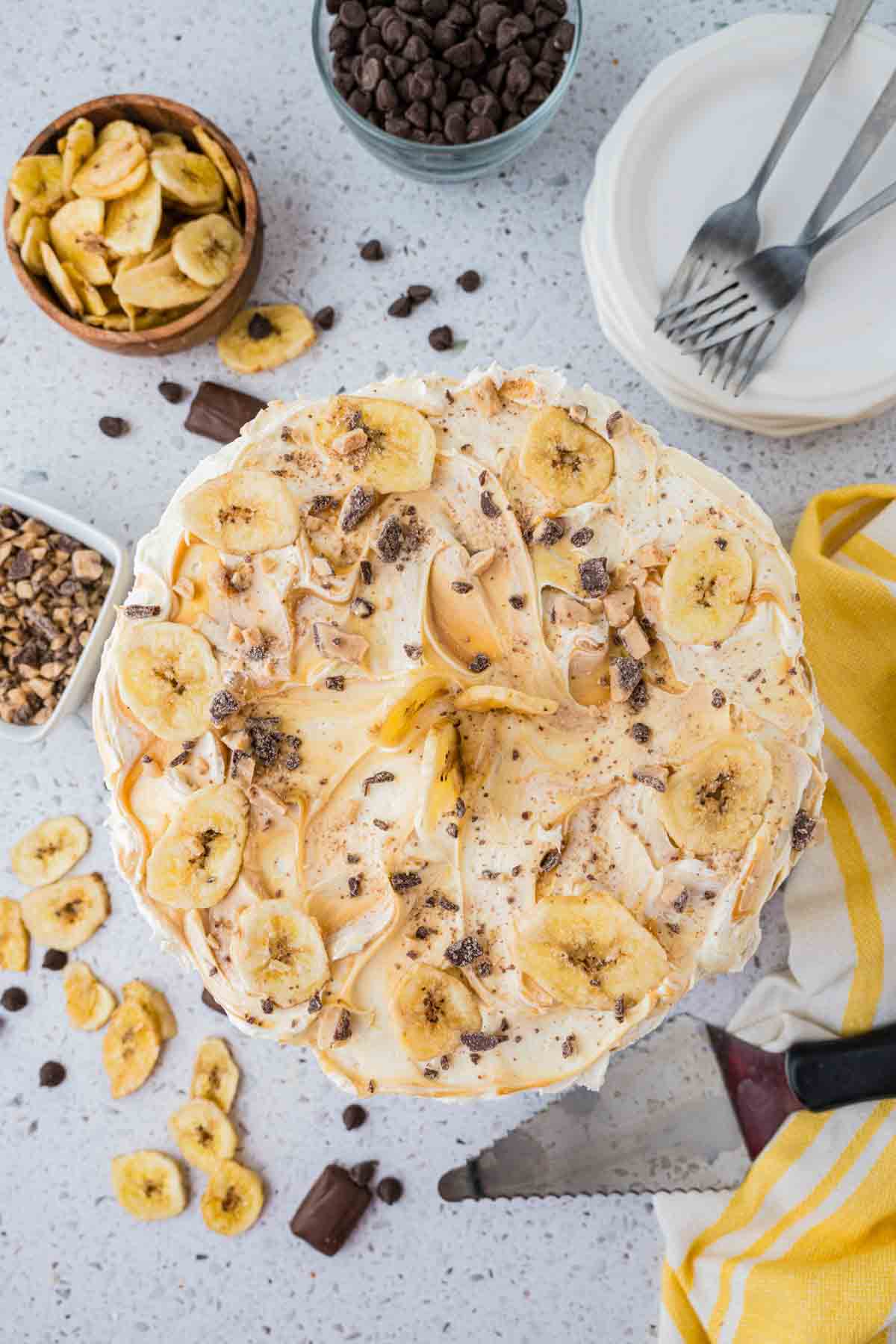 overhead view of fully decked out banoffee banana toffee cake