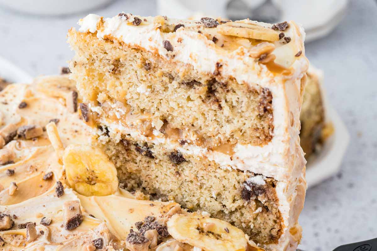 cutting a piece of banoffee cake