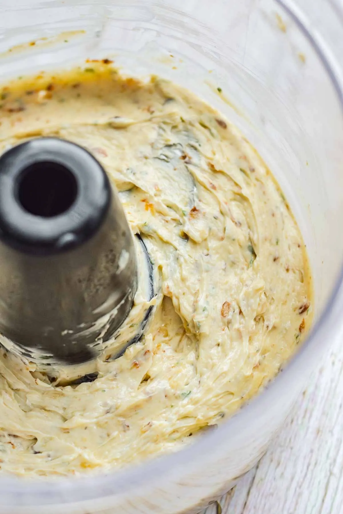 French onion compound butter in food processor after being blended