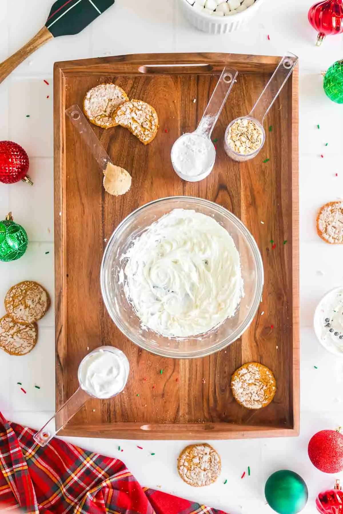 ingredients for iced oatmeal cookie dip on wooden tray