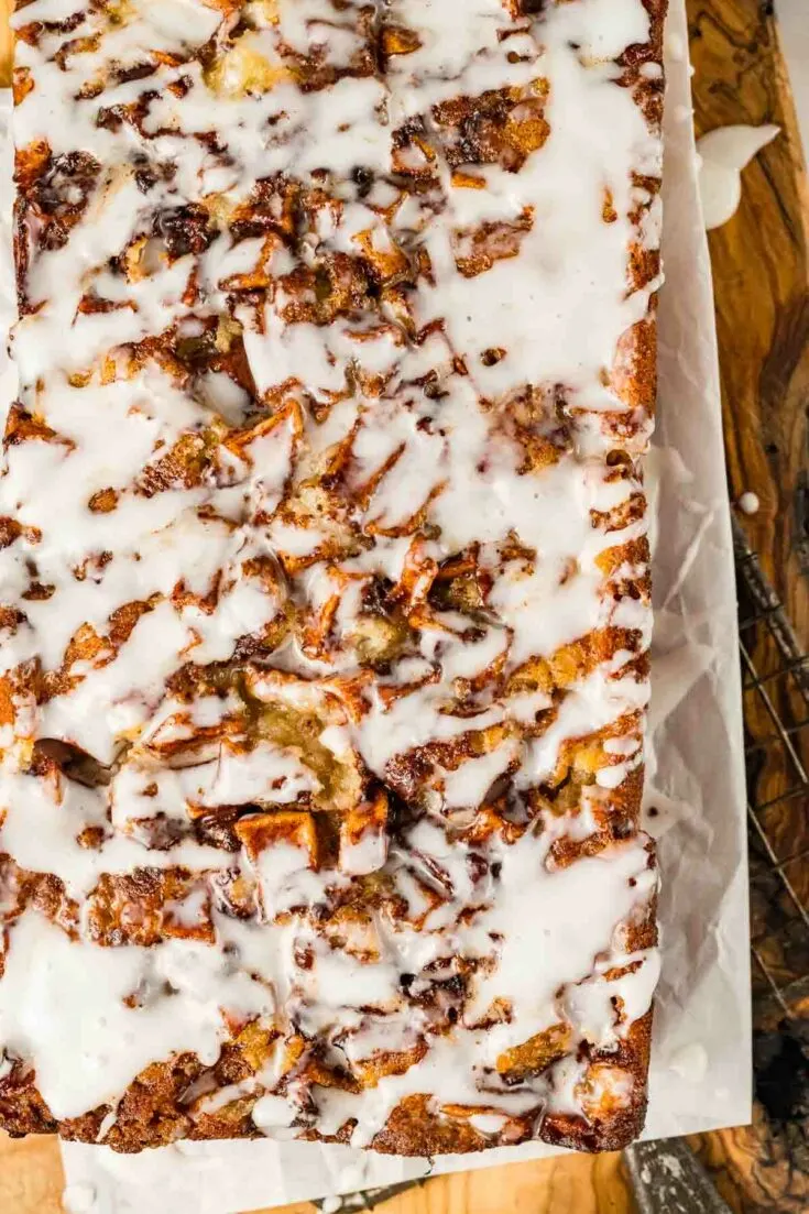 overhead picture of apple fritter bread drizzled in icing.