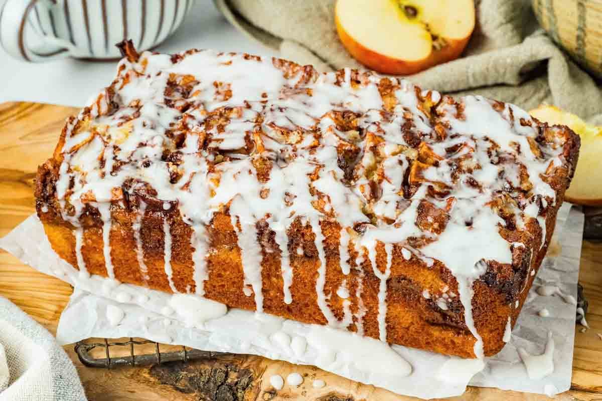 baked apple fritter bread with drizzled icing.