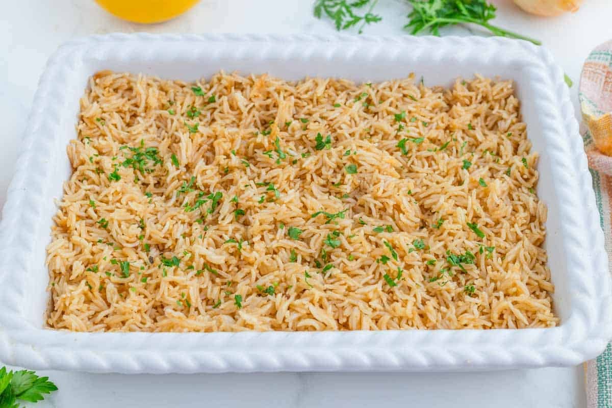 french onion rice in a white casserole dish